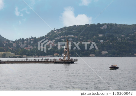 The "Life Electric" sculpture on the shores of Lake Como is a modern symbol of Lake Como at the end of the promenade. The "Life Electric" sculpture on the shores of Lake Como is a modern symbol of Lake Como at the end of the promenade. 130300042