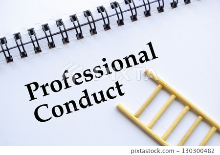 A professional notebook with ladder showing professional conduct concept A professional notebook with ladder showing professional conduct concept 130300482