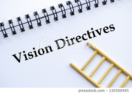 A professional notebook with ladder showing vision directives concept 130300485