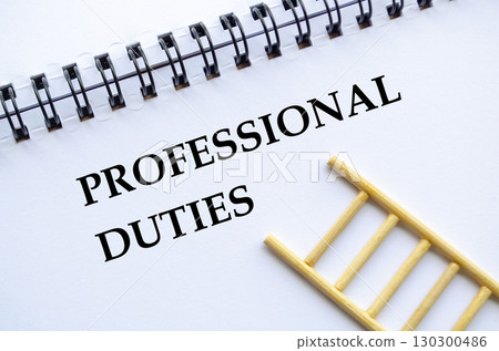A professional notebook with ladder showing professional duties concept A professional notebook with ladder showing professional duties concept 130300486