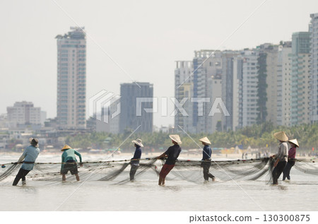 Seining in My Khe beach. 130300875