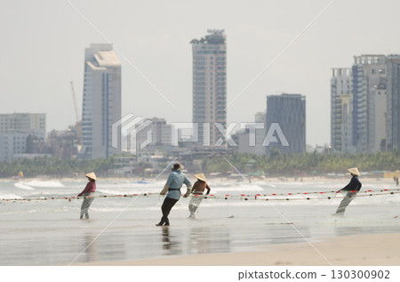 Seining in My Khe beach. 130300902