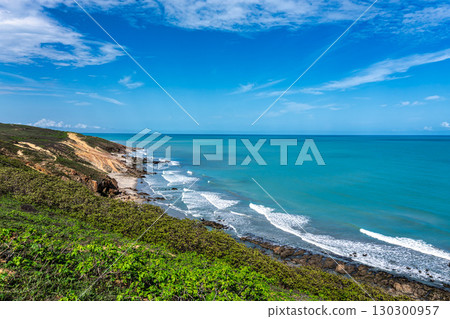 Trail along the coast and beaches from Jericoacoara to Pedra Furada in Ceara State, Brazil. 130300957