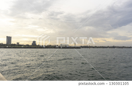 Geelong, Australia - January 2,2024 : Sailboats moor at Geelong Harbour with blue sky in Geelong, Australia on January 2,2024 . Geelong, Australia - January 2,2024 : Sailboats moor at Geelong Harbour with blue sky in Geelong, Australia on January 2,2024 . 130301105