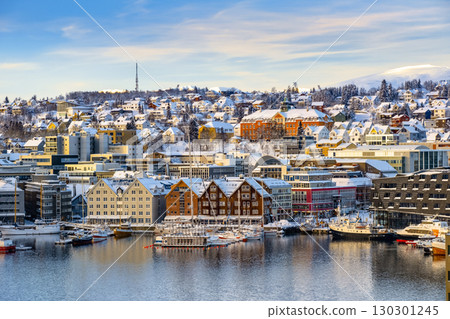 Tromso harbor with houses, fjord, cruise ships and downtown on sunny winter day Norway travel 130301245