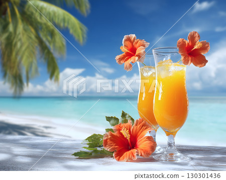 A tropical resort scene in summer with a tropical beach and hibiscus cocktails 130301436