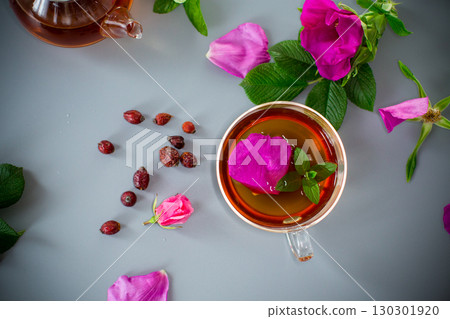 Top view of brewed rosehip tea with mint in glassware 130301920