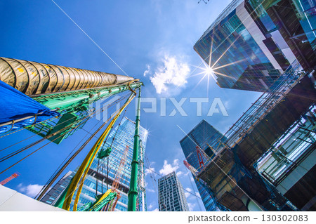 Tokyo cityscape, Japan, September 1st. Huge heavy machinery such as crawler cranes and pile drivers are lined up... = Shibuya Tokyo cityscape, Japan, September 1st. Huge heavy machinery such as crawler cranes and pile drivers are lined up... = Shibuya 130302083