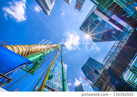 Tokyo cityscape, Japan, September 1st. Huge heavy machinery such as crawler cranes and pile drivers are lined up... = Shibuya Tokyo cityscape, Japan, September 1st. Huge heavy machinery such as crawler cranes and pile drivers are lined up... = Shibuya 130302085