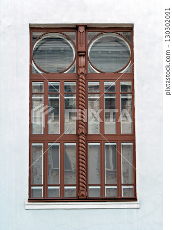 Restored original window of historic building in downtown of Krasnoyarsk city Restored original window of historic building in downtown of Krasnoyarsk city 130302091