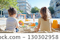 Children playing in urban sandbox sunny day 130302958