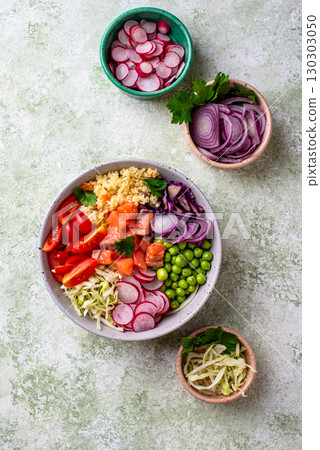 Balanced healthy bowl with vegetables and salmon 130303050