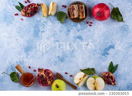 Rosh Hashana concept with honey, apple and pomegranate Rosh Hashana concept with honey, apple and pomegranate 130303053