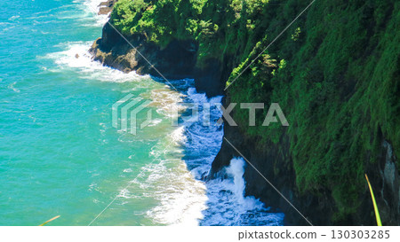 beautiful landscape of nature Indonesia ocean with cliff. Summer vacation destination southeast asia  beautiful landscape of nature Indonesia ocean with cliff. Summer vacation destination southeast asia  130303285