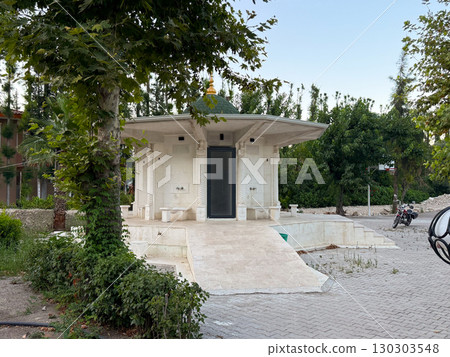 Ablution area with marble basins and decorative columns. Religion, Islamic tradition, and cultural architecture for prayer preparation. 130303548