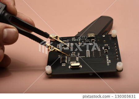 The SMD component tester. Investigation of the parameters of the SMD components using a tester probe. The SMD component tester. Investigation of the parameters of the SMD components using a tester probe. 130303631