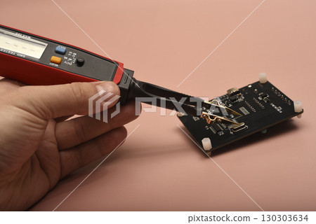 The SMD component tester. Investigation of the parameters of the SMD components using a tester probe. The SMD component tester. Investigation of the parameters of the SMD components using a tester probe. 130303634