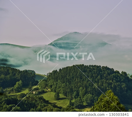 Green Valley in Basque Country with Mount Txindoki in Mist Green Valley in Basque Country with Mount Txindoki in Mist 130303841