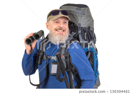 Adventurer preparing for a wilderness hike with gear and binoculars in exploration-ready pose Adventurer preparing for a wilderness hike with gear and binoculars in exploration-ready pose 130304481