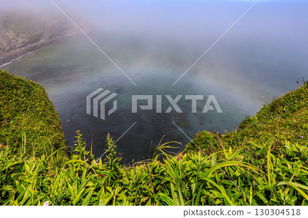 The fantastic scenery of Cape Nosappu enveloped in a misty rainbow 130304518