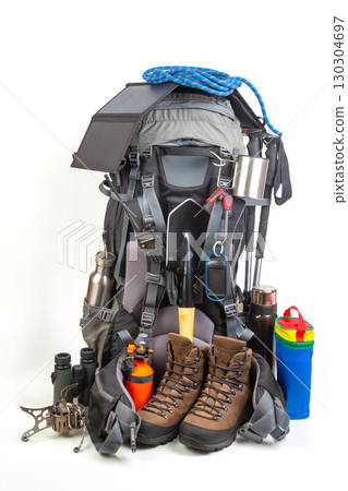 Essential hiking gear packed for your outdoor adventure with backpack and equipment Essential hiking gear packed for your outdoor adventure with backpack and equipment 130304697
