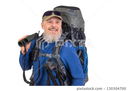 Experienced hiker ready for adventure with large backpack and binoculars in outdoor setting 130304700