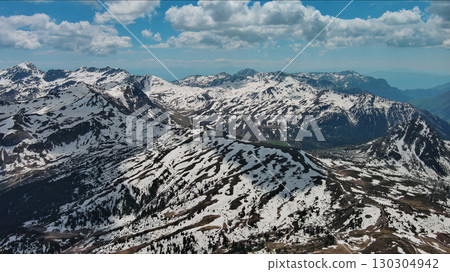 Rocky snow mountains before sunset aerial Rocky snow mountains before sunset aerial 130304942