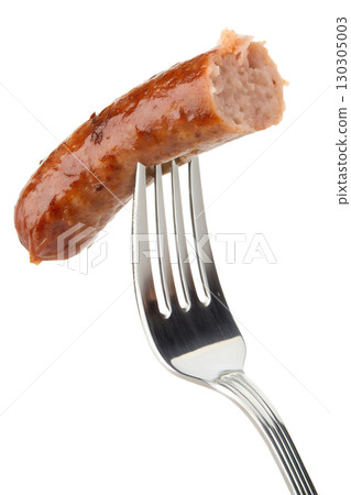 Grilled sausage on fork isolated on transparent background, cooked meat ready to eat, barbecue food 130305003