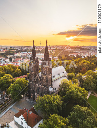 Vysehrad Basilica of St. Peter and St. Paul stands tall against a stunning sunrise in Prague. Vysehrad Basilica of St. Peter and St. Paul stands tall against a stunning sunrise in Prague. 130305179
