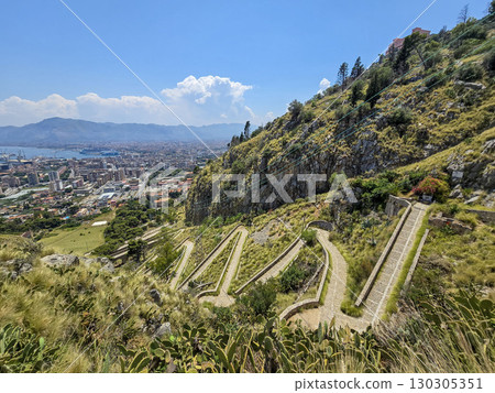 View of the winding old stone path leading up Mount Pellegrino, Sicily View of the winding old stone path leading up Mount Pellegrino, Sicily 130305351