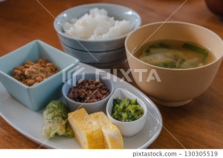 A Japanese breakfast of rice, miso soup, and natto 130305519