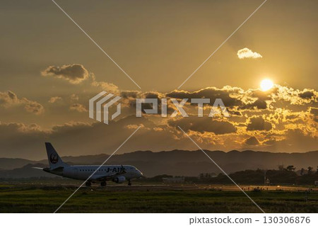 Sendai Airport at dusk, airplane taking off, Natori City, Miyagi Prefecture 130306876