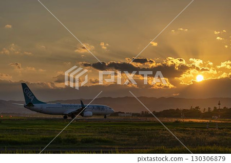 Sendai Airport at dusk, airplane taking off, Natori City, Miyagi Prefecture 130306879
