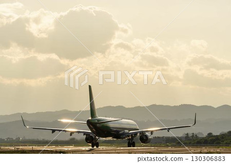 Sendai Airport at dusk, airplane taking off, Natori City, Miyagi Prefecture 130306883
