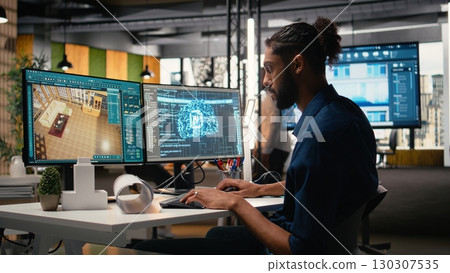 Real estate developer in a corporate office using machine learning, cognitive computing and cybernetics to analyze blueprints and property layouts. Residential and commercial investments. 130307535