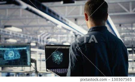 Data center admin using AI LLM chatbot suggestions to improve rigs processing speed and efficiency. Server hub worker using large language model to support artificial intelligence workloads, camera B Data center admin using AI LLM chatbot suggestions to improve rigs processing speed and efficiency. Server hub worker using large language model to support artificial intelligence workloads, camera B 130307565