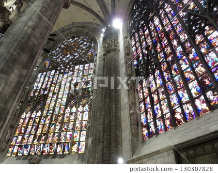 The interior of the cathedral, filled with light and color, and one of the world's largest and most beautiful stained glass windows. Posters, calendars, spatial presentations, magazines The interior of the cathedral, filled with light and color, and one of the world's largest and most beautiful stained glass windows. Posters, calendars, spatial presentations, magazines 130307828