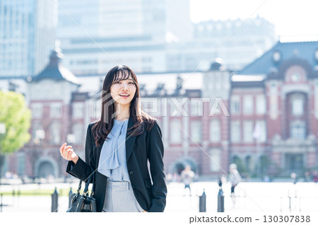 Portrait of a young career woman commuting to work Portrait of a young career woman commuting to work 130307838