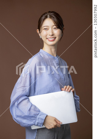 Female pointing 130307992