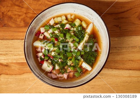Delicious Fresh Vegetable Soup made with vibrant Herbs and flavorful Seasoning for your meal Delicious Fresh Vegetable Soup made with vibrant Herbs and flavorful Seasoning for your meal 130308189