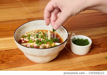 A Freshly Garnished Bowl of Flavorful and Delicious Soup, Perfect for Any Meal, Anytime A Freshly Garnished Bowl of Flavorful and Delicious Soup, Perfect for Any Meal, Anytime 130308221