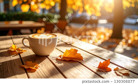 Drinking coffee at a natural cafe in an autumn park 130308877