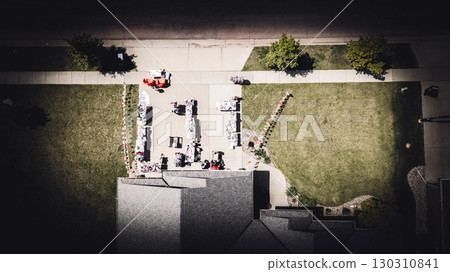 Aerial view above a garage yard sale in a residential area  130310841