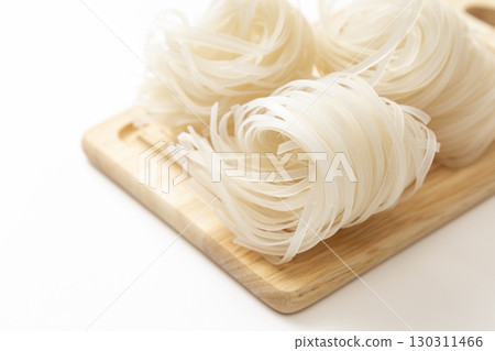 Rice noodles on white background Rice noodles on white background 130311466