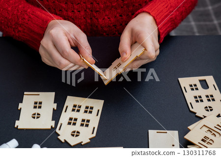 Master class of making craft wooden houses for conscientious Merry Christmas decor. Sustainable celebration minimal responsible DIY holiday project. Step by step instruction Festive modern 130311768