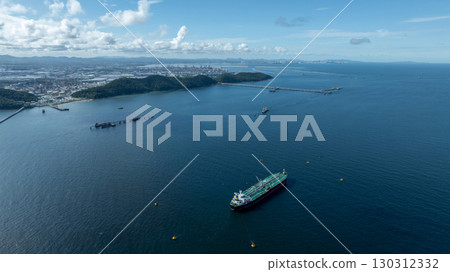 Aerial view crude oil tanker ship at sea, Green crude oil tanker ship top view, Logistic and maritime transpoprtation of petroleum, Modern offshore terminal loading tanker ship. Aerial view crude oil tanker ship at sea, Green crude oil tanker ship top view, Logistic and maritime transpoprtation of petroleum, Modern offshore terminal loading tanker ship. 130312332