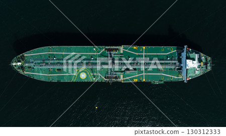 Aerial view crude oil tanker ship at sea, Green crude oil tanker ship top view, Logistic and maritime transpoprtation of petroleum, Modern offshore terminal loading tanker ship. Aerial view crude oil tanker ship at sea, Green crude oil tanker ship top view, Logistic and maritime transpoprtation of petroleum, Modern offshore terminal loading tanker ship. 130312333
