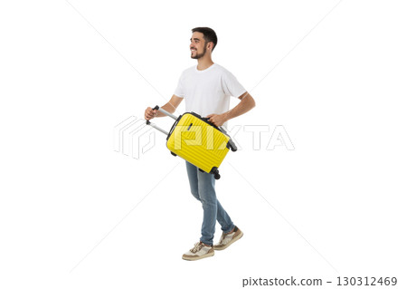 Young man walks happily with a bright yellow suitcase, isolated, PNG 130312469