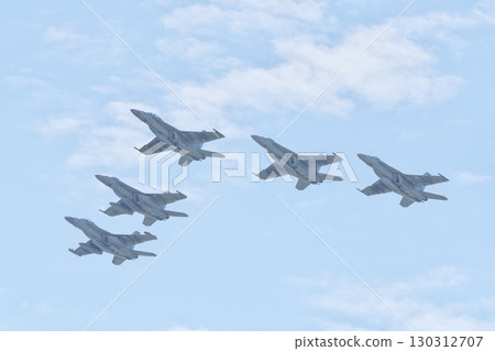 U.S. Navy F/A-18 Super Hornets flying in formation 130312707
