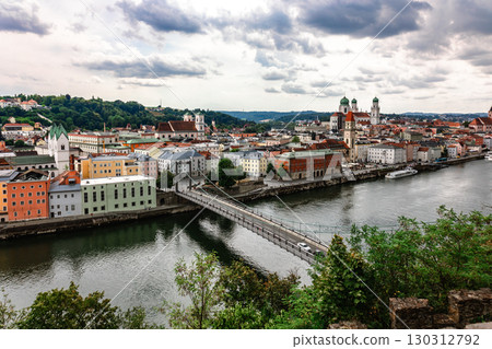 Panoramic view of Passau. Top view of suspension bridge. Aerial skyline of old town with beautiful reflection in Danube river, Bavaria, Germany. High quality photo Panoramic view of Passau. Top view of suspension bridge. Aerial skyline of old town with beautiful reflection in Danube river, Bavaria, Germany. High quality photo 130312792